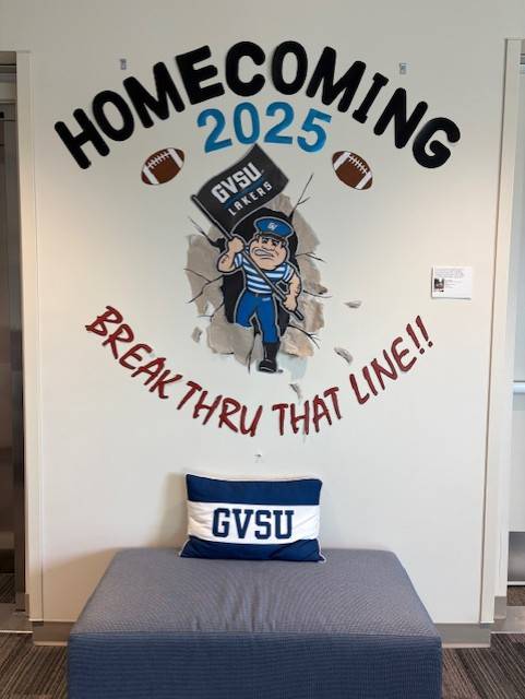 Homecoming 2025, "Break thru that line," Louie coming out of the wall